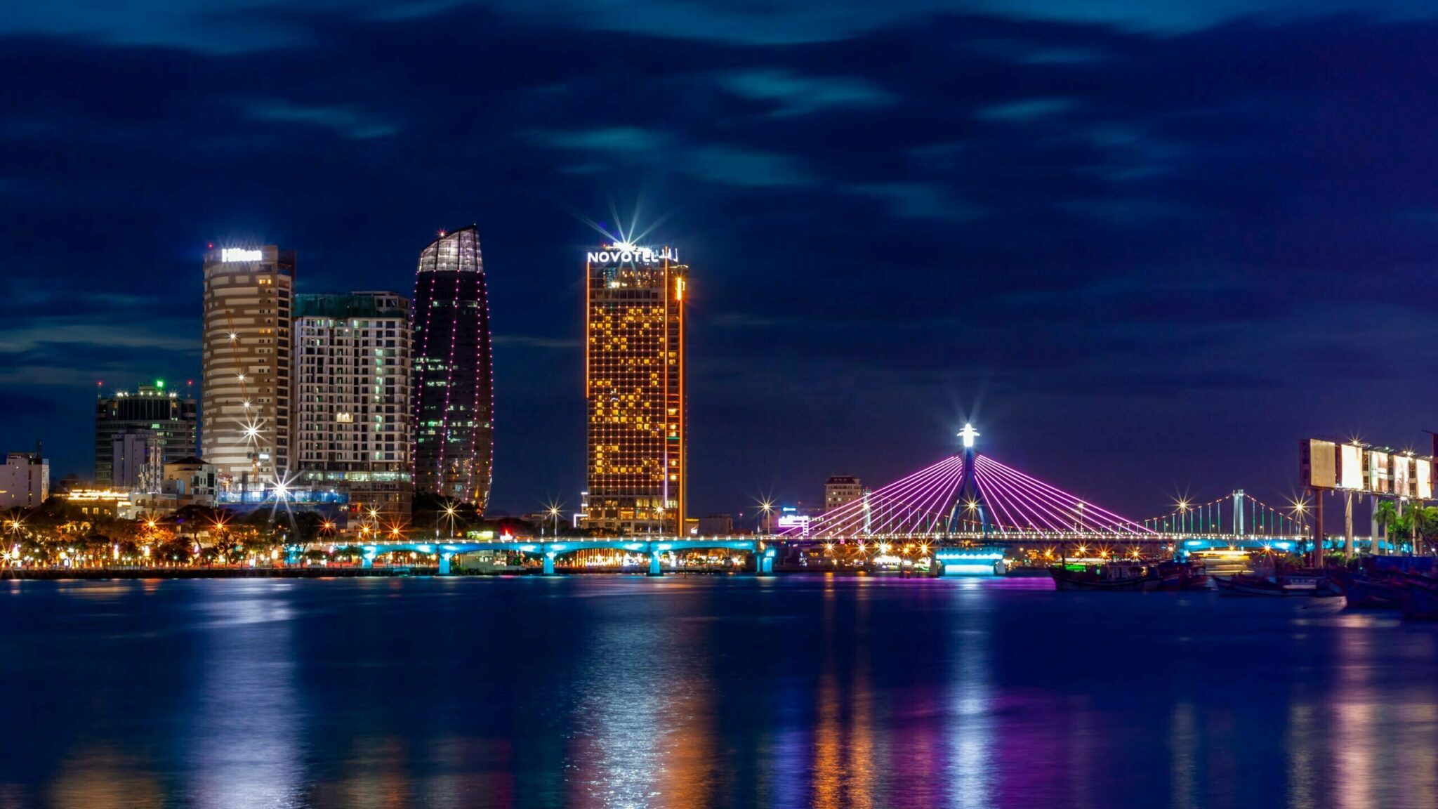 Han River Bridge in Vietnam Night View scaled - The Planners