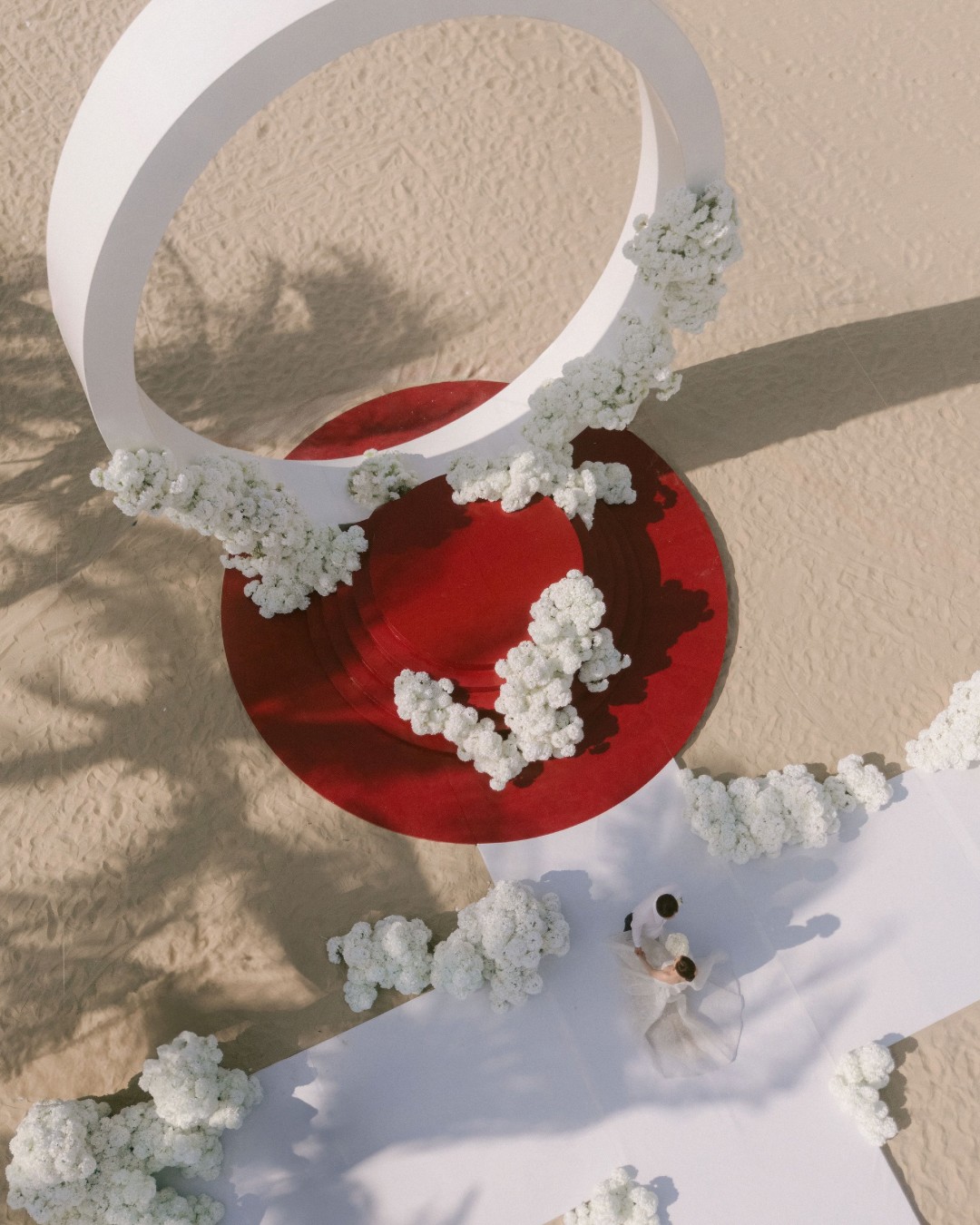 Circle wedding arch by the beach
